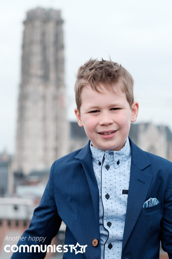 Zicht vanop dak Lamot met Sint-romboutstoren op achtergrond